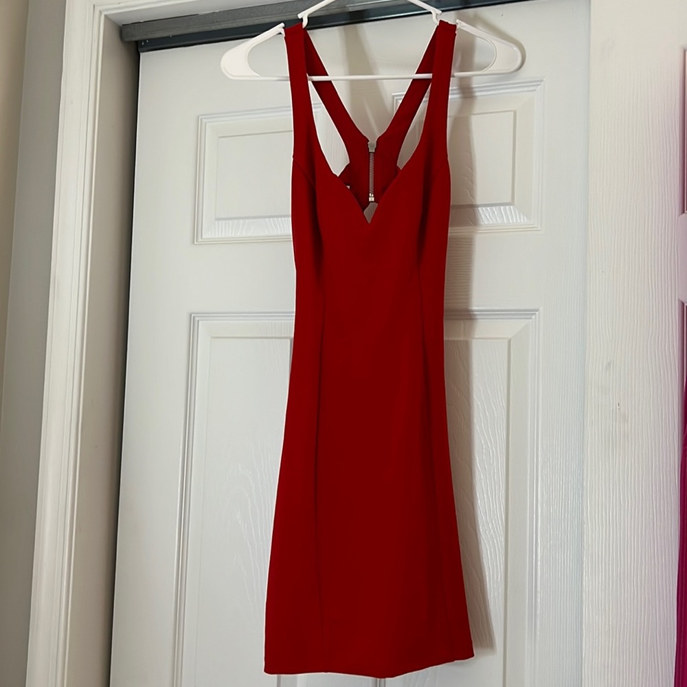 Medium red mini right dress. Open back. Great condition